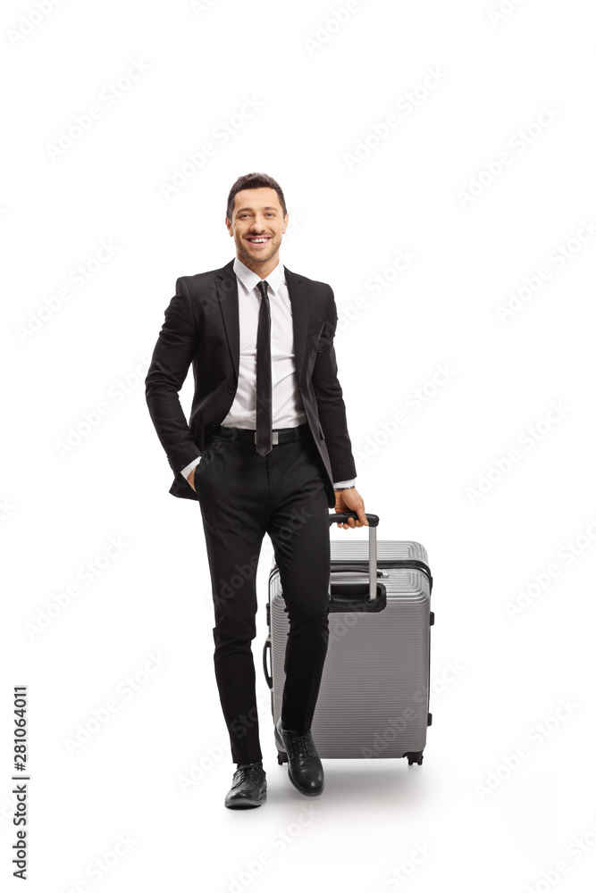 Businessman with a suitcase walking towards the camera Businessman with a suitcase walking towards the camera