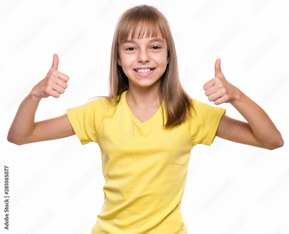 Close-up emotional portrait of caucasian little girl. Funny kid making thumbs up gesture, isolated on white background. Beautiful child laughing looking very happy. Close-up emotional portrait of caucasian little girl. Funny kid making thumbs up gesture, isolated on white background. Beautiful child laughing looking very happy.