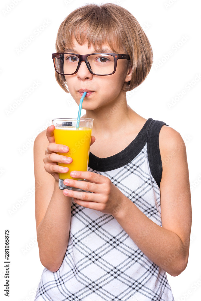 Beautiful caucasian little girl drinking fresh orange juice. Emotional portrait of attractive happy child with eyeglasses, isolated on white background. Beautiful caucasian little girl drinking fresh orange juice. Emotional portrait of attractive happy child with eyeglasses, isolated on white background.