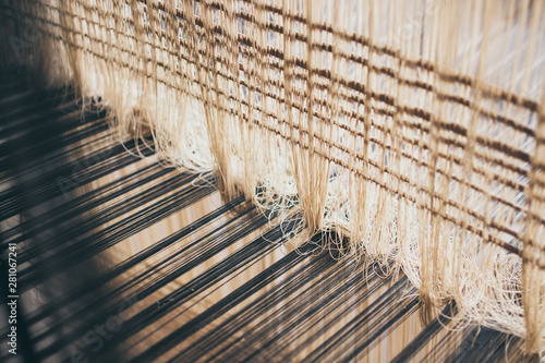 Slika na platnu Weaving threads inside the loom