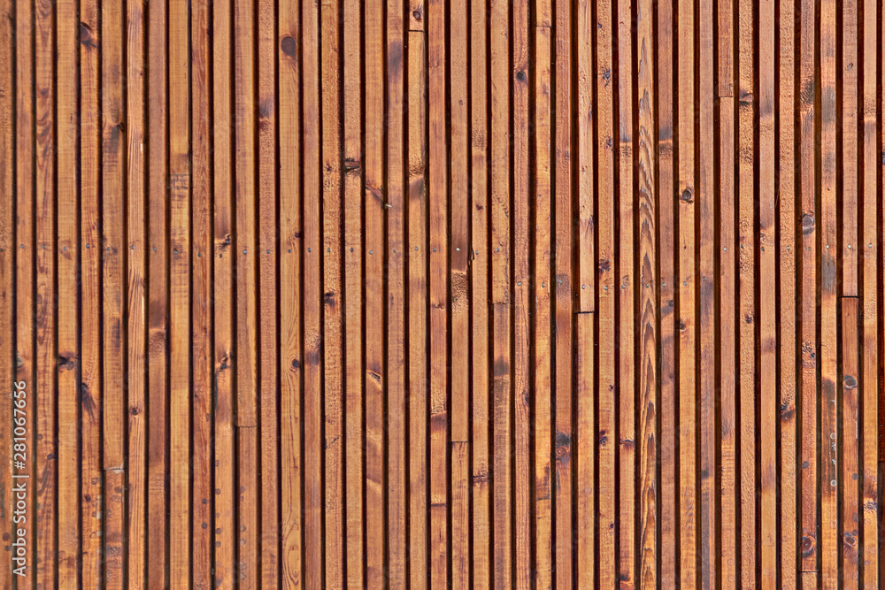 The texture of the surface of the wooden planks. Background of the ceiling cladding planks. Smooth boards with knots. The texture of the surface of the wooden planks. Background of the ceiling cladding planks. Smooth boards with knots.