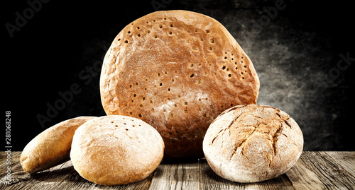 Rolls and braed on wooden t...