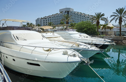 View of the Gulf of Eilat with luxury yachts. On the yacht you can sunbathe, jump into the open sea and enjoy drinks and fruits. © AlexanderD