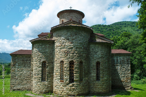 10th century ancient Christian church, Nizhnearhizy temples, Northern Zelenchuk temple, stone temple among mountains and vegetation photo