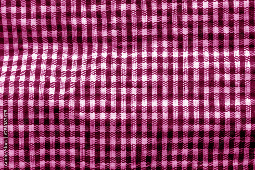 Checked fabric texture in pink tone.