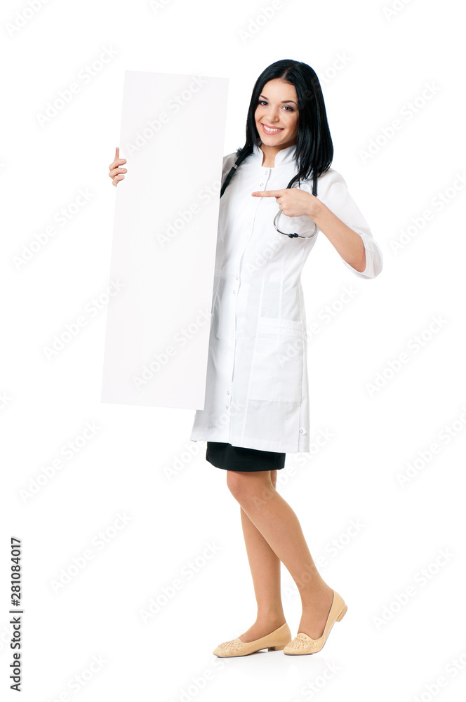 Full length portrait of happy young female doctor with stethoscope showing blank placard board. Beautiful smiling medical doctor woman, isolated on white background. Full length portrait of happy young female doctor with stethoscope showing blank placard board. Beautiful smiling medical doctor woman, isolated on white background.