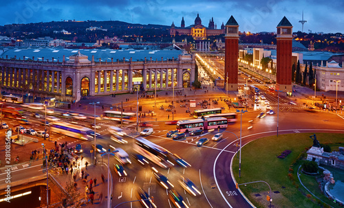 Barcelona, Spain. Nighttime top view at Spanish Square with tower and national palace art museum Catalonia far away.