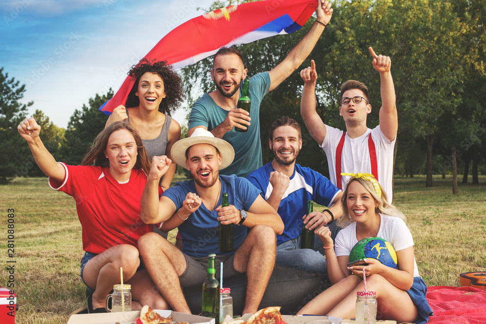 Fototapeta premium Young friends enjoy in party at the park