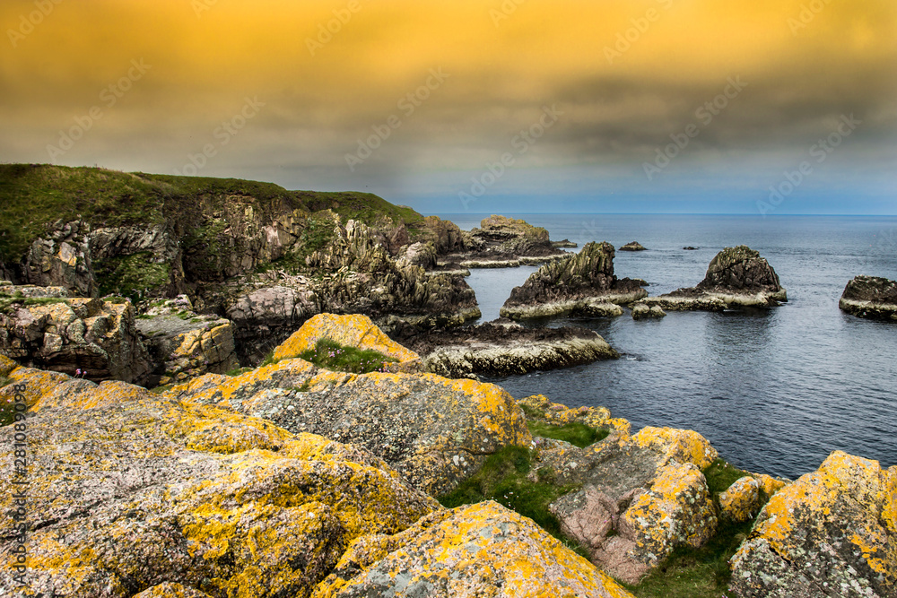 Cliffs and the sea near Cruden Bay, Peterhead, Aberdeenshire, Scotland, UK