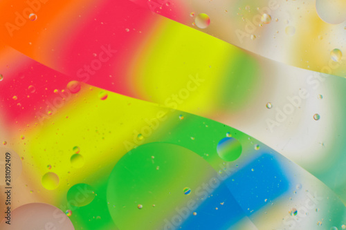 abstract blurred background colored oil stains on water