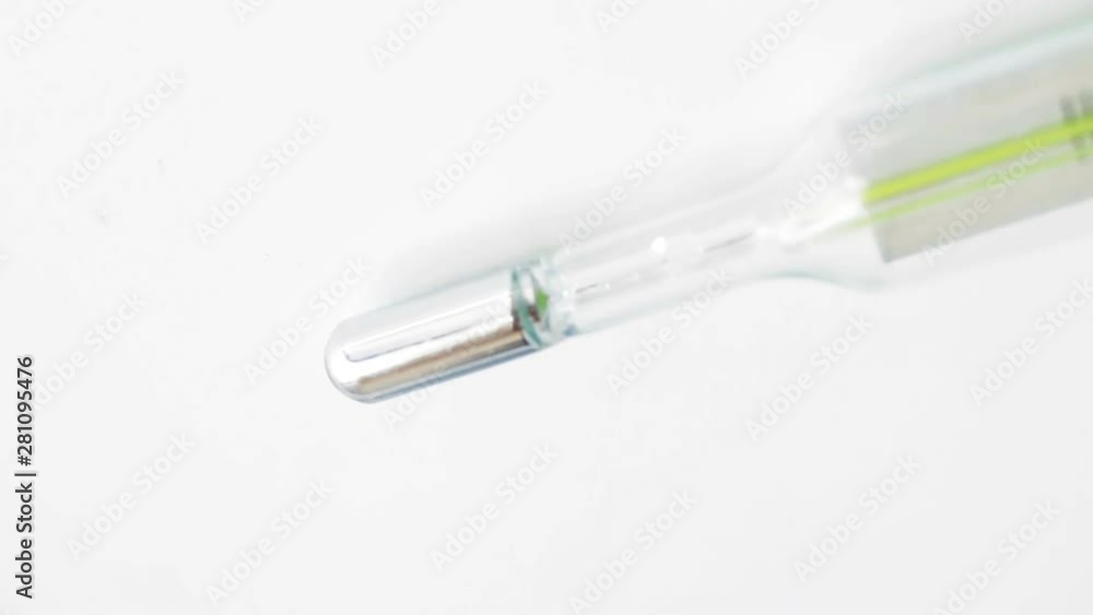 Medical thermometer macro shot. Close-up. Selective focus. Slow pan. Medical thermometer macro shot. Close-up. Selective focus. Slow pan.