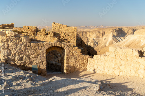 Sunrise from the top of Mount Masada in Israel near the Jordan border. Location of ancient Roman Israeli War, ending in mass suicide. photo