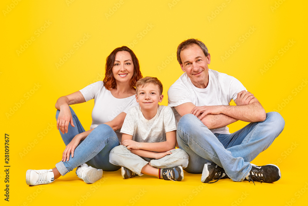 Happy family sitting together
