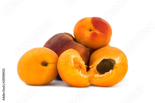 Red peach and apricots on white background