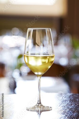 Glass of white wine photo