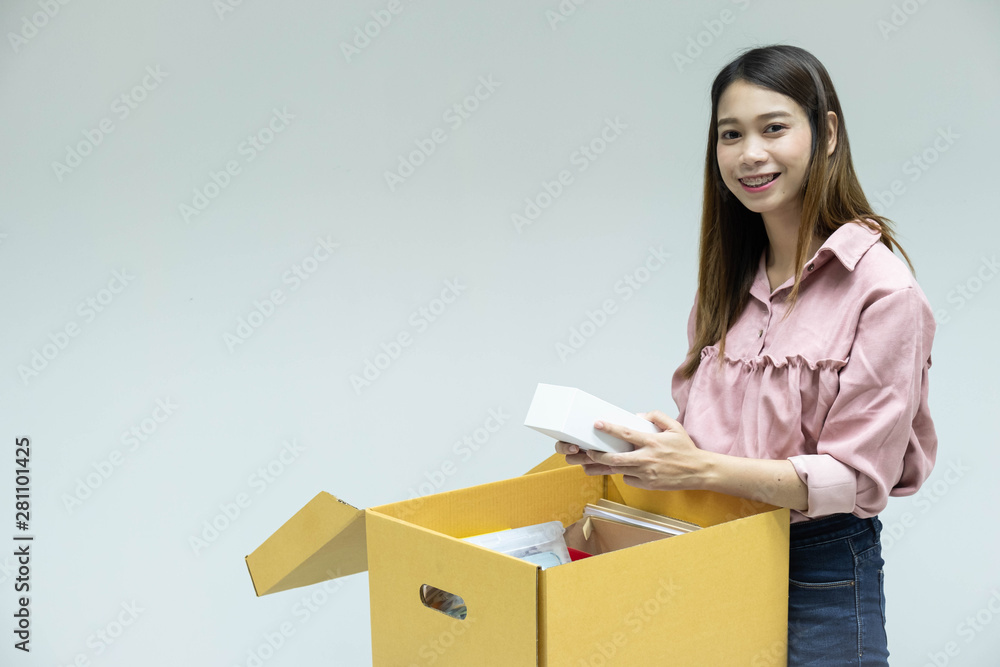 Beautiful young asian woman with cardboard box Beautiful young asian woman with cardboard box