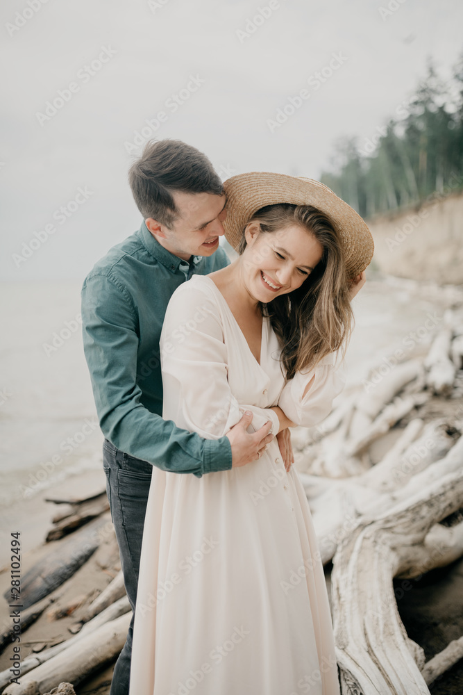 Happy couple kissing and embracing Happy couple kissing and embracing