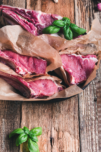 Raw veal steaks, preparing food photo