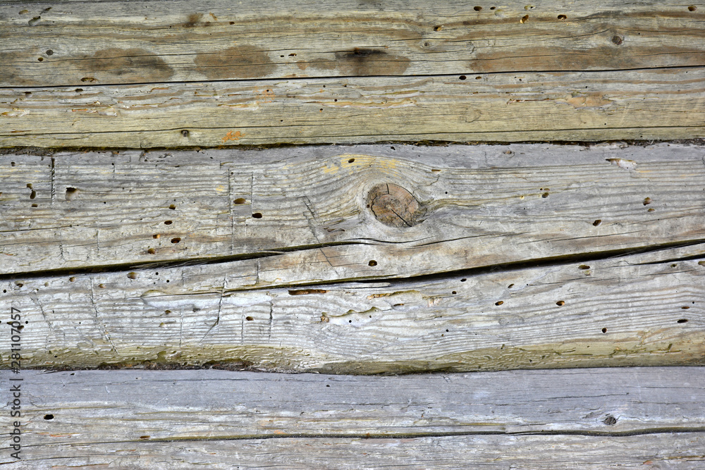 Old wood log with knots and cracks. Old wood log with knots and cracks.