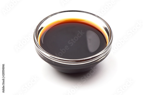 Tasty soy sauce in a bowl, isolated on white background