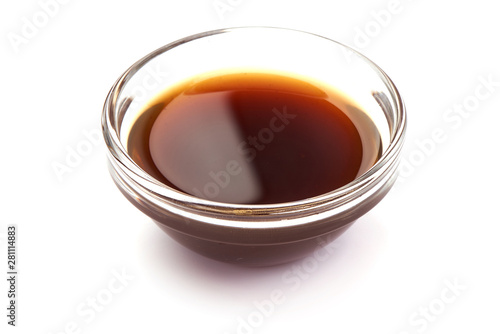 Worcestershire Sauce in a bowl, isolated on white background photo