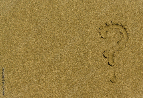 Question mark on the sand