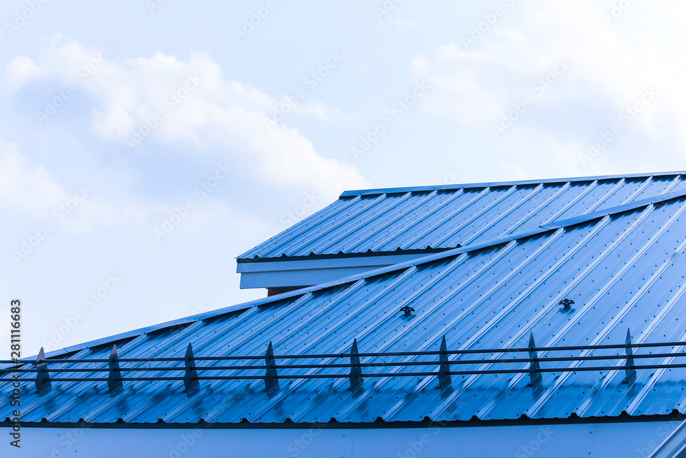 Hard roof lines and blue sky soft lines Hard roof lines and blue sky soft lines