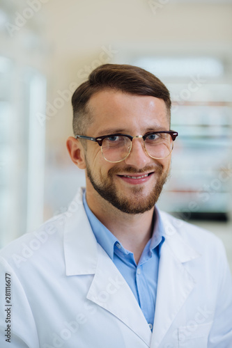 Portrait of handsome man that working in drug store