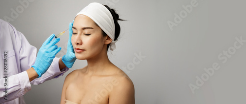 Treatment with botox concept, Asian Woman receiving Botox injection