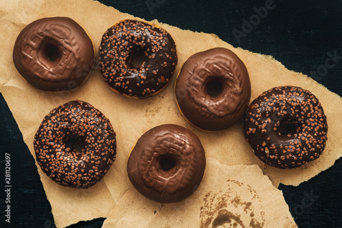 Billede på lærred Top view of tasty homemade chocolate doughnuts