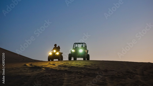 Fototapeta Naklejka Na Ścianę i Meble -  Buggy by night in Huacachina desert of Ica, Peru