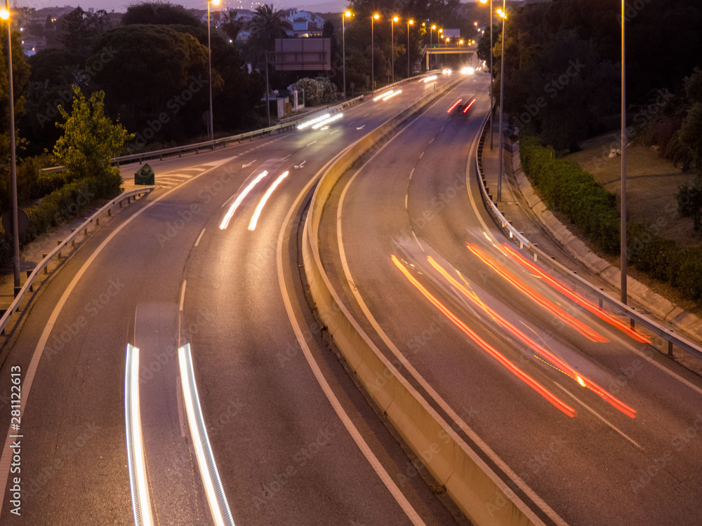 Top View Road in the evening with car lights and street lights Top View Road in the evening with car lights and street lights