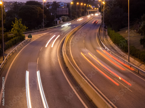 Top View Road in the evening with car lights and street lights