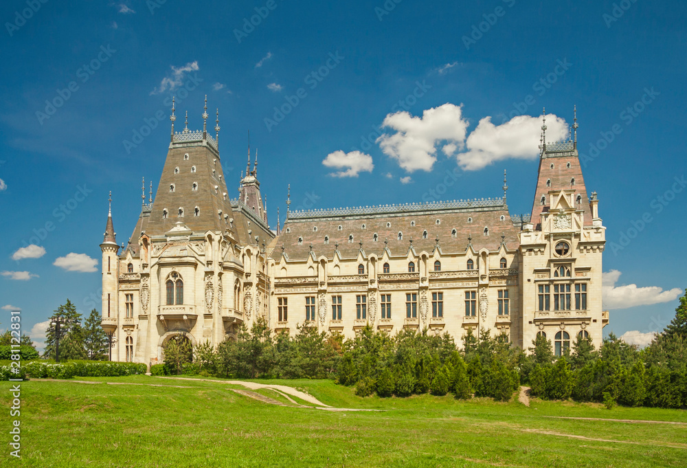 Romania - Moldavia - Iasi - Cultural Palace in the city center resembling a medieval castle with gabled roofs on a sunny summer day