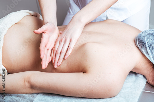 women's hands doing massage at the Spa