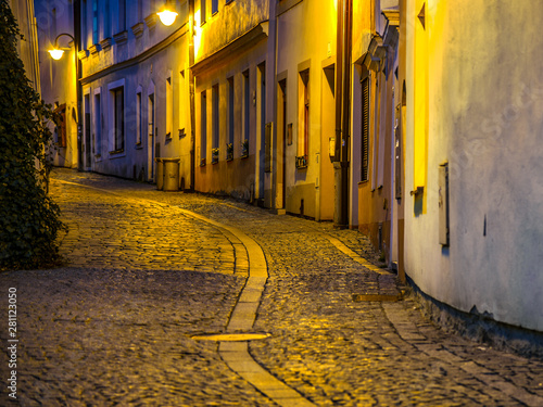 Quadro em tela Narrow cobbled ancient street in Medieval old town of Tabor, Czech Republic