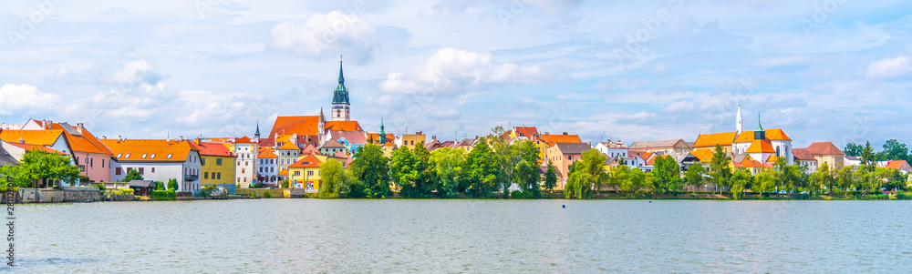 Jindrichuv Hradec panoramic cityscape with Vajgar pond in the foreground. Czech Republic