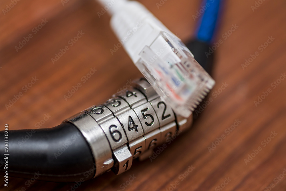 Computer internet cable and lock. Internet security concept. Digital cyber safety or security encryption concept Computer internet cable and lock. Internet security concept. Digital cyber safety or security encryption concept