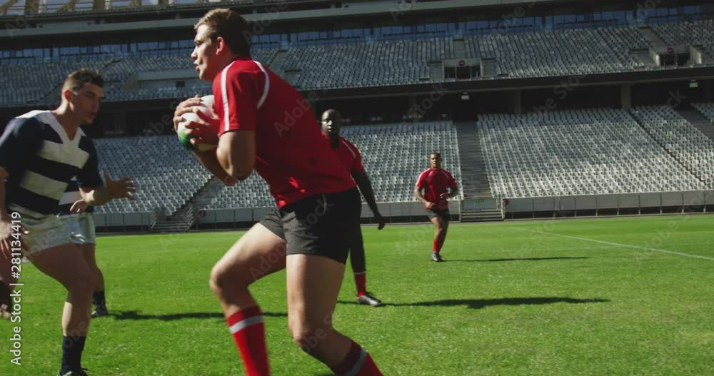 Rugby players playing rugby match in stadium 4k