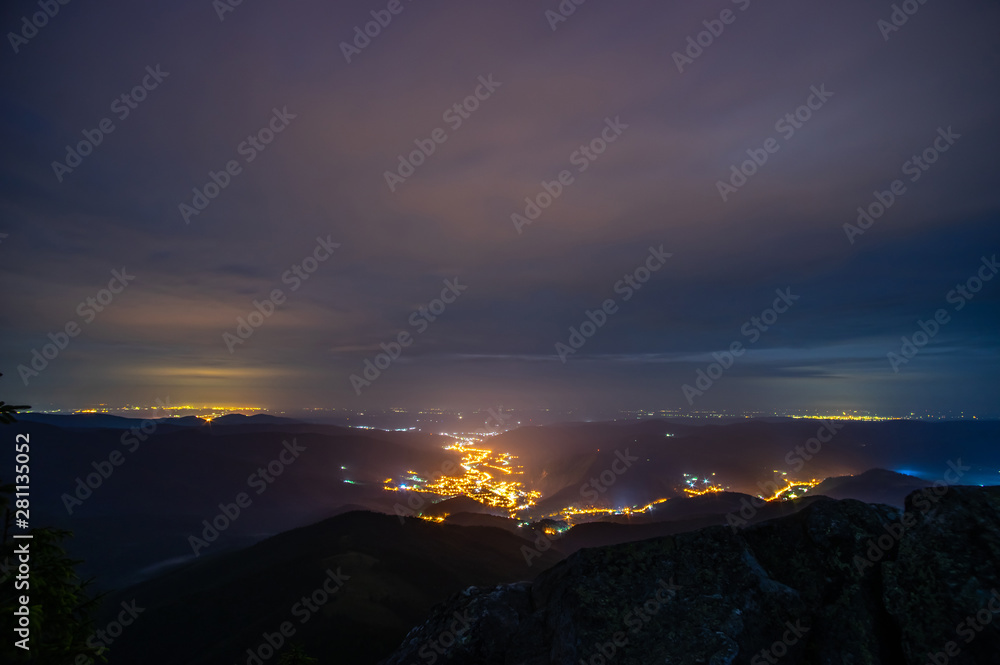 Night town among the mountains
