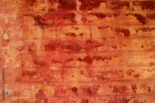 Blurred image of an old painted brick wall texture. Abstract texture background. Old wall background with a lot of copy space for text.