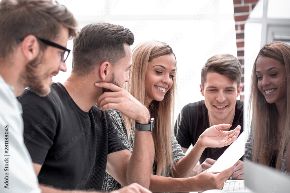 Fototapeta premium Group of three people analyze data on desktop computer.
