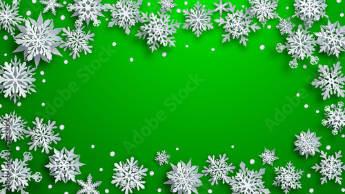 Christmas illustration of white complex paper snowflakes with soft shadows on green background