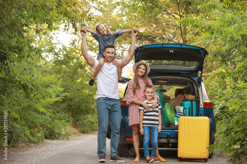 Happy family near car with ...