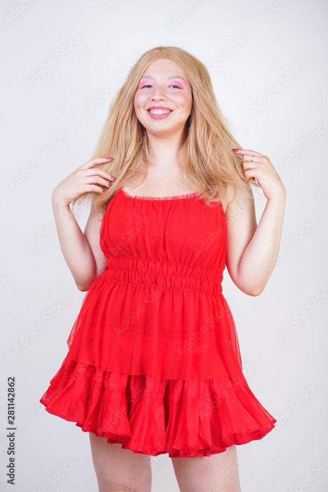 Plus size asian fashion model in red dress Plus size asian fashion model in red dress