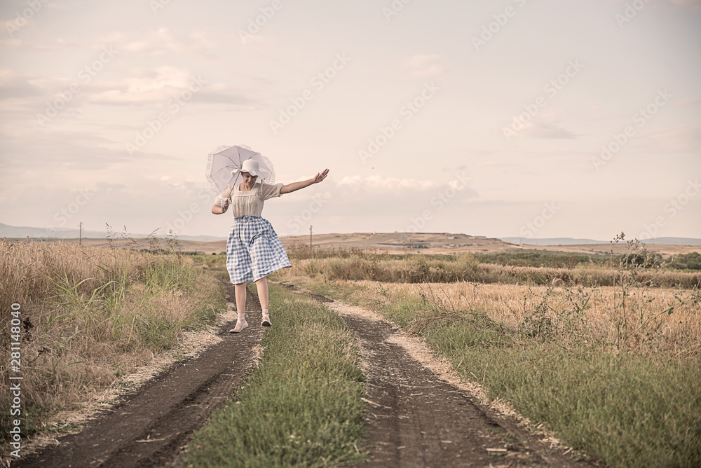 Girl  in a field of wheat