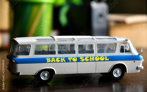 Model bus ZIL 118 "Youth" on the desk. Back to school.
