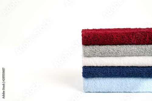 Stack of towels on white background. photo