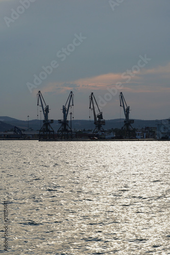 Cranes are seen in the distance ready to unload cargo from ships   © Thomas