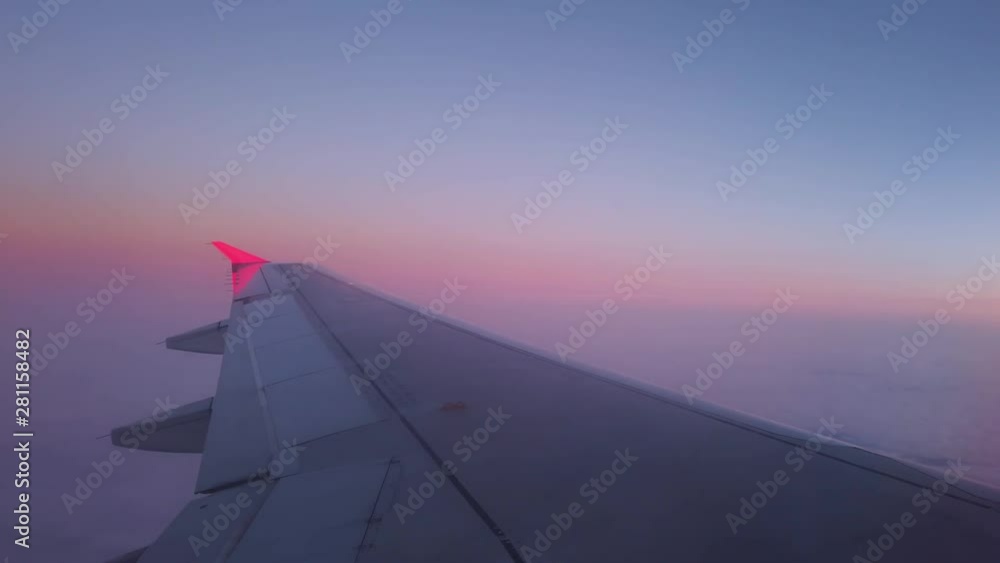 TIMELAPSE Of Plane Wing In Sunset Light TIMELAPSE Of Plane Wing In Sunset Light